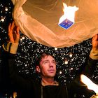 Jeff Harris releasing a sky lantern